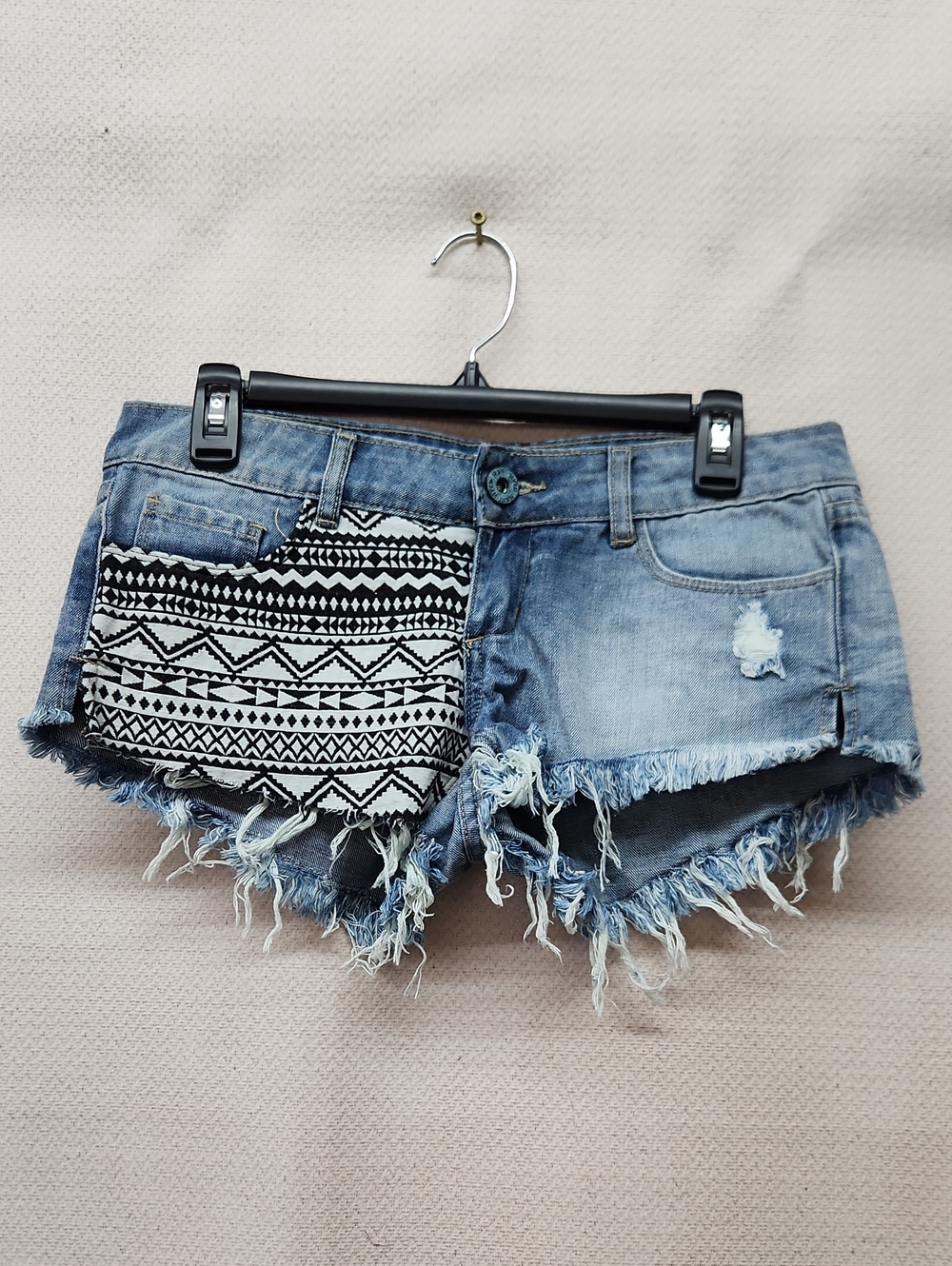 Frayed Light Blue Denim Shorts with Tribal Pocket